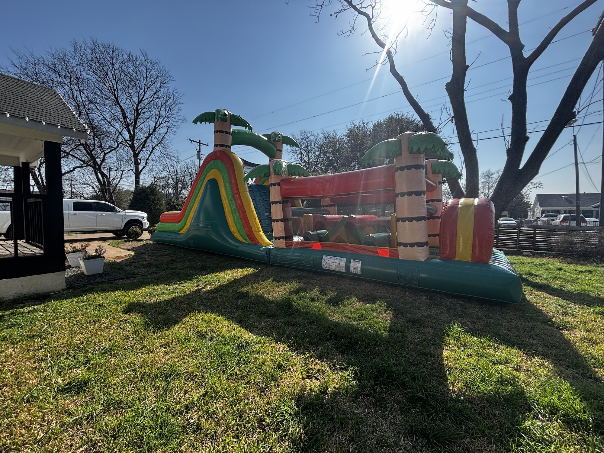 Tropical obstacle course rental in Dallas County backyard
